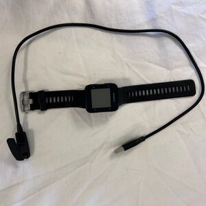 GARMIN watch and charger, some scratches.  Forerunner